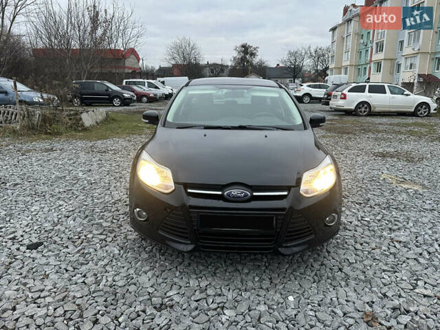 Черный Форд Фокус, объемом двигателя 1.6 л и пробегом 233 тыс. км за 6400 $, фото 7 на Automoto.ua