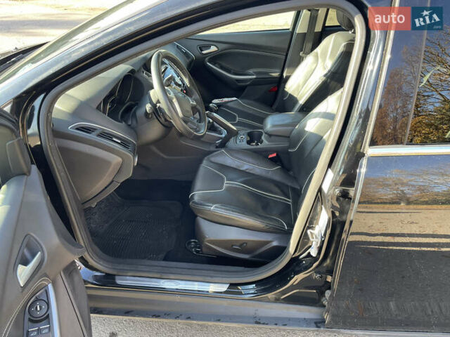 Черный Форд Фокус, объемом двигателя 1.6 л и пробегом 222 тыс. км за 8499 $, фото 14 на Automoto.ua