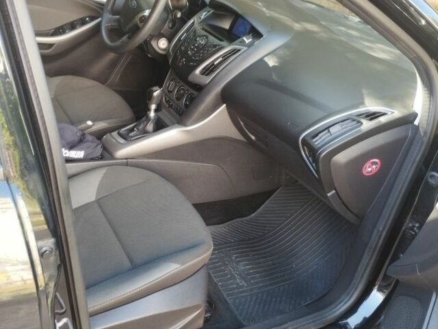 Черный Форд Фокус, объемом двигателя 1.6 л и пробегом 230 тыс. км за 7100 $, фото 2 на Automoto.ua