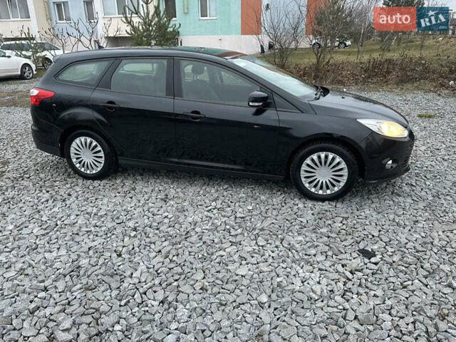 Черный Форд Фокус, объемом двигателя 1.6 л и пробегом 233 тыс. км за 6400 $, фото 10 на Automoto.ua