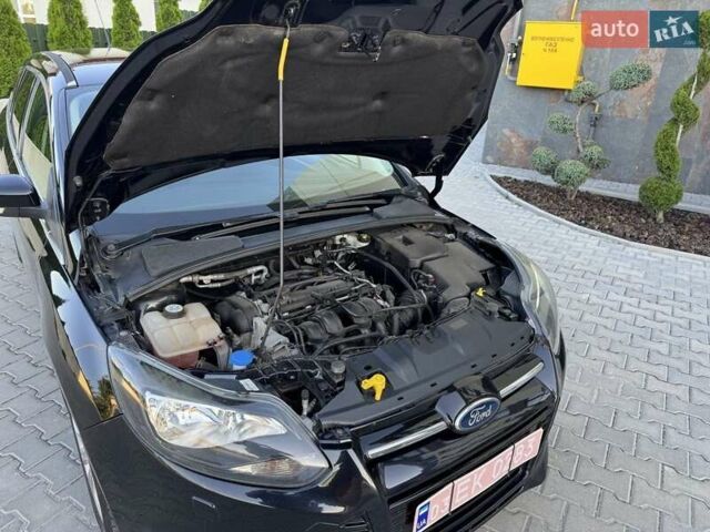 Черный Форд Фокус, объемом двигателя 1.6 л и пробегом 300 тыс. км за 7500 $, фото 7 на Automoto.ua