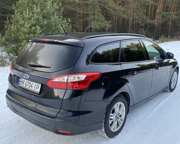 Черный Форд Фокус, объемом двигателя 1.6 л и пробегом 280 тыс. км за 6500 $, фото 1 на Automoto.ua