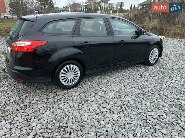 Черный Форд Фокус, объемом двигателя 1.6 л и пробегом 233 тыс. км за 6400 $, фото 9 на Automoto.ua