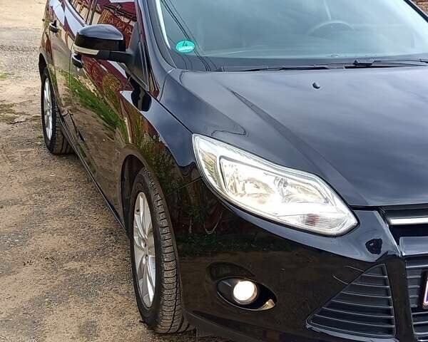 Черный Форд Фокус, объемом двигателя 1.6 л и пробегом 188 тыс. км за 8600 $, фото 12 на Automoto.ua