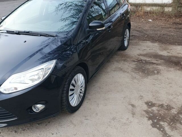 Черный Форд Фокус, объемом двигателя 1.6 л и пробегом 234 тыс. км за 6000 $, фото 1 на Automoto.ua