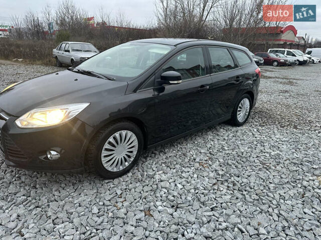 Черный Форд Фокус, объемом двигателя 1.6 л и пробегом 233 тыс. км за 6400 $, фото 11 на Automoto.ua