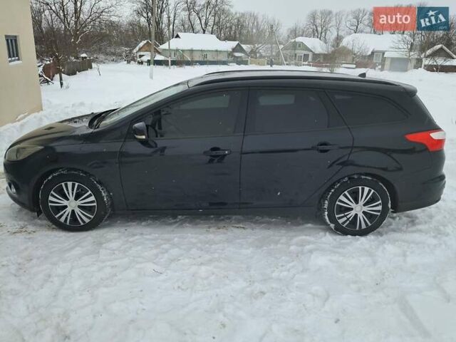 Чорний Форд Фокус, об'ємом двигуна 1.56 л та пробігом 237 тис. км за 7500 $, фото 1 на Automoto.ua