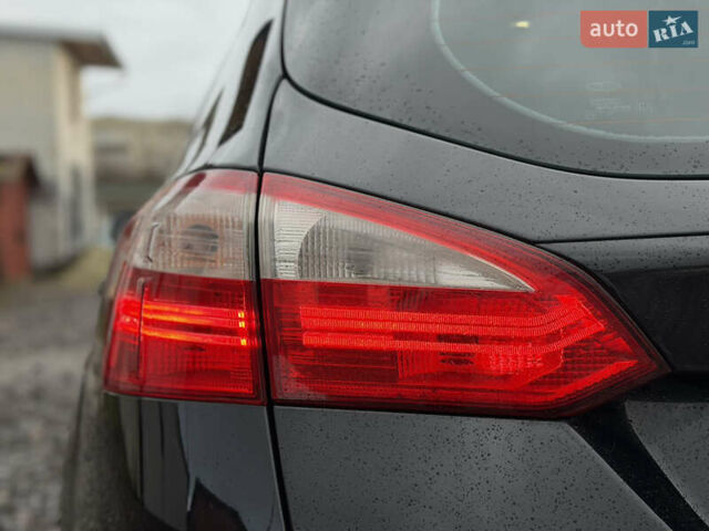 Чорний Форд Фокус, об'ємом двигуна 1.56 л та пробігом 243 тис. км за 6999 $, фото 10 на Automoto.ua