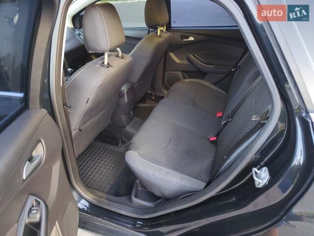 Черный Форд Фокус, объемом двигателя 1.6 л и пробегом 264 тыс. км за 8099 $, фото 9 на Automoto.ua