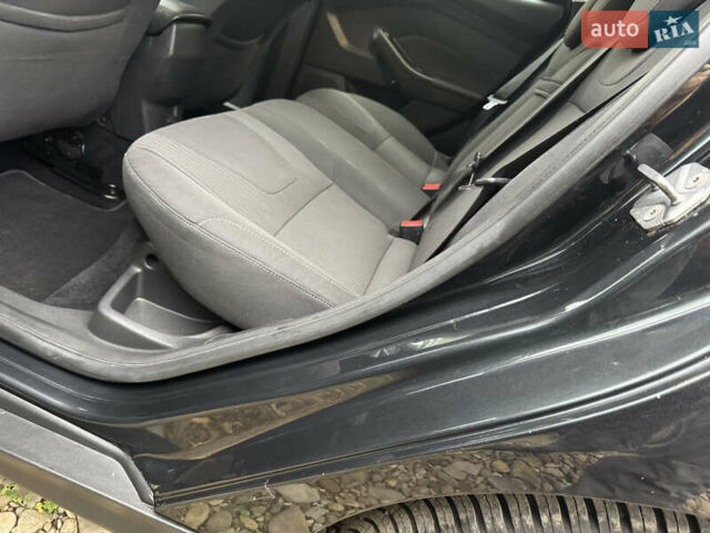 Чорний Форд Фокус, об'ємом двигуна 1.6 л та пробігом 227 тис. км за 8299 $, фото 22 на Automoto.ua