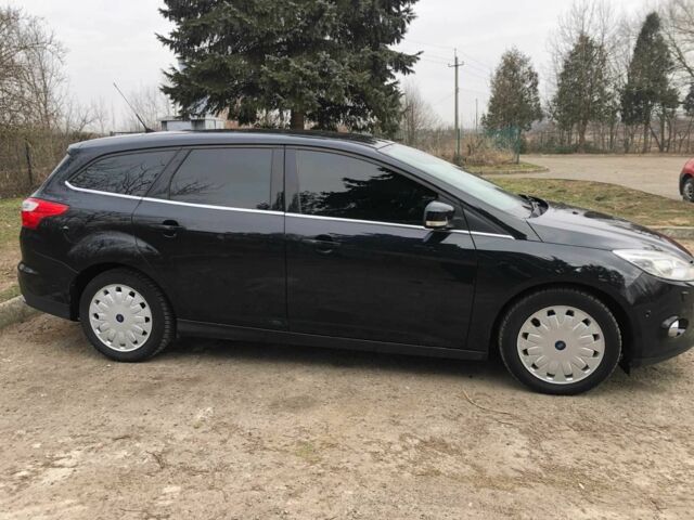 Черный Форд Фокус, объемом двигателя 1.6 л и пробегом 214 тыс. км за 7799 $, фото 15 на Automoto.ua