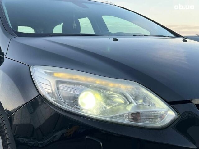 Чорний Форд Фокус, об'ємом двигуна 1.6 л та пробігом 295 тис. км за 7890 $, фото 11 на Automoto.ua