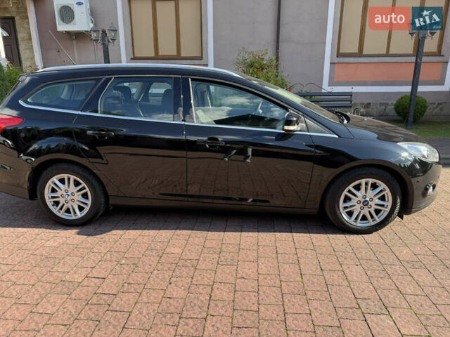 Чорний Форд Фокус, об'ємом двигуна 1.6 л та пробігом 227 тис. км за 8299 $, фото 97 на Automoto.ua