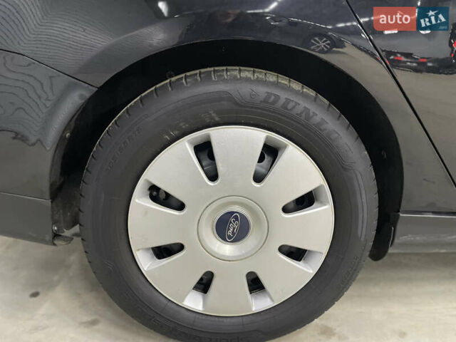 Черный Форд Фокус, объемом двигателя 1.6 л и пробегом 211 тыс. км за 7750 $, фото 11 на Automoto.ua