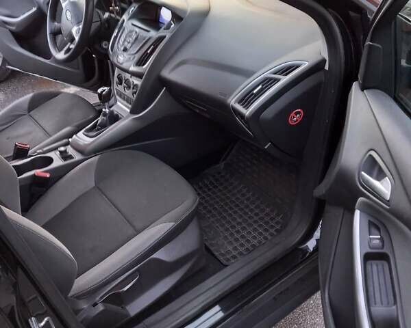 Черный Форд Фокус, объемом двигателя 1.6 л и пробегом 250 тыс. км за 7000 $, фото 6 на Automoto.ua