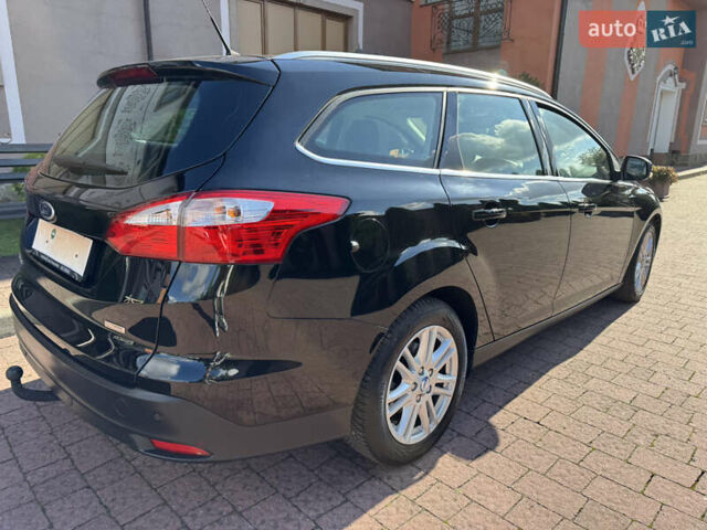 Чорний Форд Фокус, об'ємом двигуна 1.6 л та пробігом 227 тис. км за 8299 $, фото 100 на Automoto.ua