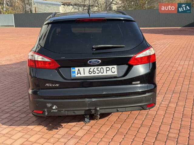 Черный Форд Фокус, объемом двигателя 1.56 л и пробегом 266 тыс. км за 6499 $, фото 3 на Automoto.ua