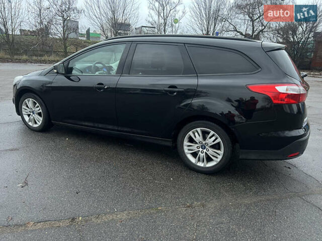 Черный Форд Фокус, объемом двигателя 1.6 л и пробегом 180 тыс. км за 7400 $, фото 2 на Automoto.ua
