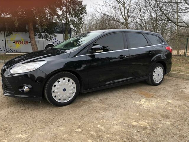 Черный Форд Фокус, объемом двигателя 1.6 л и пробегом 214 тыс. км за 7799 $, фото 1 на Automoto.ua