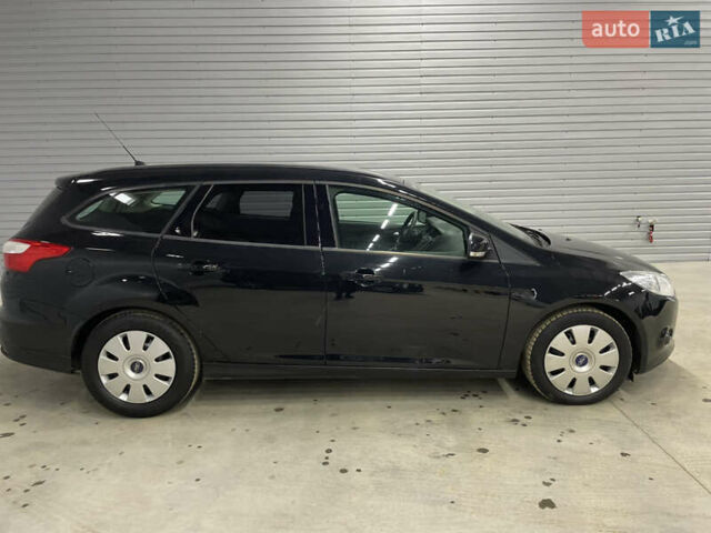 Черный Форд Фокус, объемом двигателя 1.6 л и пробегом 211 тыс. км за 7750 $, фото 3 на Automoto.ua