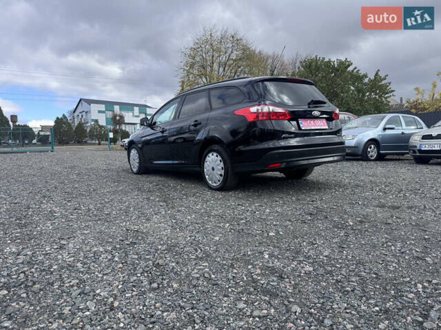 Черный Форд Фокус, объемом двигателя 1.6 л и пробегом 195 тыс. км за 7590 $, фото 13 на Automoto.ua
