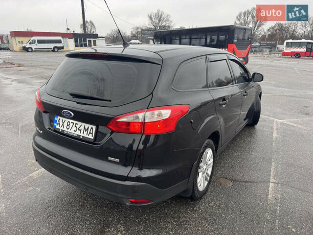 Черный Форд Фокус, объемом двигателя 1.6 л и пробегом 281 тыс. км за 7300 $, фото 7 на Automoto.ua