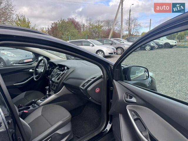 Черный Форд Фокус, объемом двигателя 1.6 л и пробегом 195 тыс. км за 7590 $, фото 27 на Automoto.ua