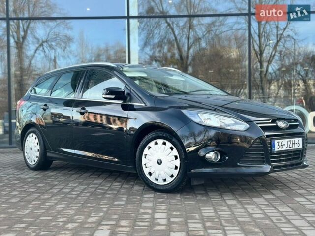 Черный Форд Фокус, объемом двигателя 1.6 л и пробегом 227 тыс. км за 8499 $, фото 1 на Automoto.ua
