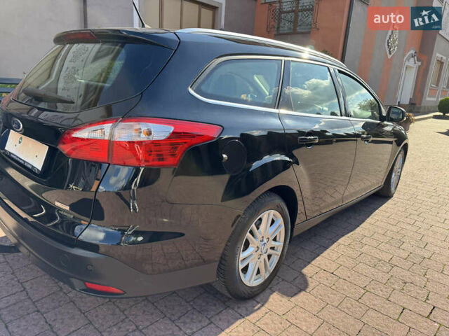 Чорний Форд Фокус, об'ємом двигуна 1.6 л та пробігом 227 тис. км за 8299 $, фото 102 на Automoto.ua