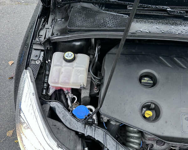 Чорний Форд Фокус, об'ємом двигуна 1.6 л та пробігом 269 тис. км за 6950 $, фото 33 на Automoto.ua