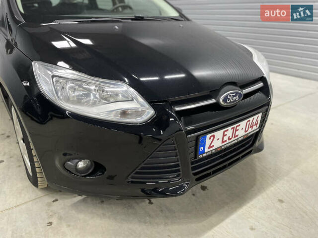 Черный Форд Фокус, объемом двигателя 1.6 л и пробегом 211 тыс. км за 7750 $, фото 7 на Automoto.ua