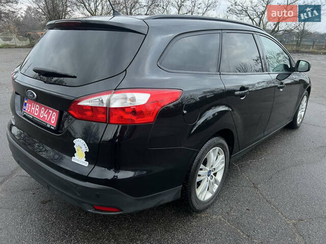 Черный Форд Фокус, объемом двигателя 1.6 л и пробегом 180 тыс. км за 7400 $, фото 5 на Automoto.ua