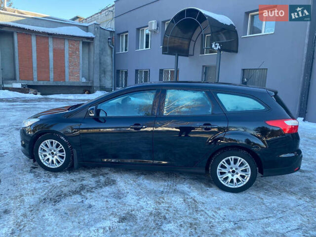Чорний Форд Фокус, об'ємом двигуна 2 л та пробігом 233 тис. км за 8200 $, фото 9 на Automoto.ua