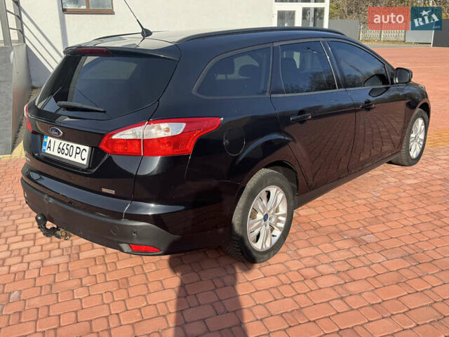 Черный Форд Фокус, объемом двигателя 1.6 л и пробегом 264 тыс. км за 6400 $, фото 7 на Automoto.ua