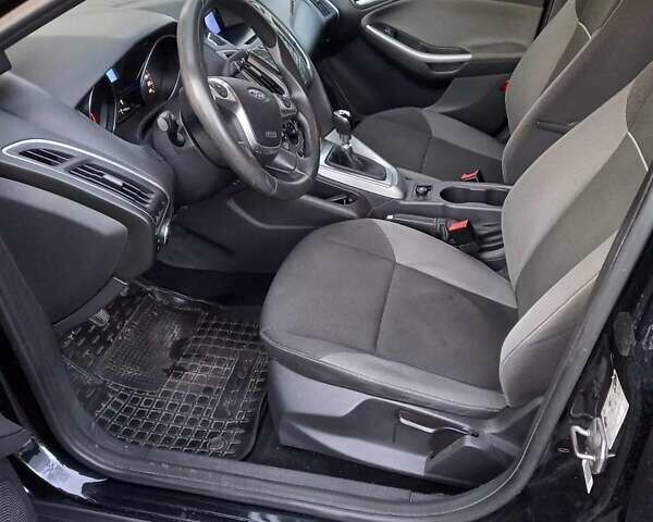 Черный Форд Фокус, объемом двигателя 1.6 л и пробегом 250 тыс. км за 7000 $, фото 5 на Automoto.ua