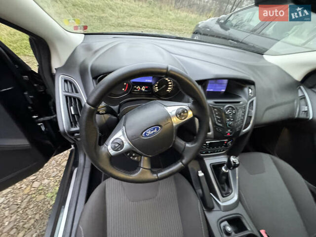 Чорний Форд Фокус, об'ємом двигуна 1.6 л та пробігом 227 тис. км за 8299 $, фото 6 на Automoto.ua