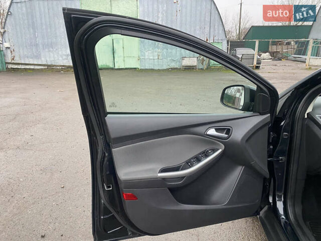 Чорний Форд Фокус, об'ємом двигуна 1.6 л та пробігом 225 тис. км за 7790 $, фото 24 на Automoto.ua