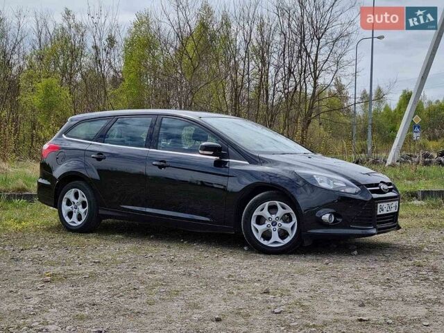 Черный Форд Фокус, объемом двигателя 1.6 л и пробегом 215 тыс. км за 7900 $, фото 1 на Automoto.ua