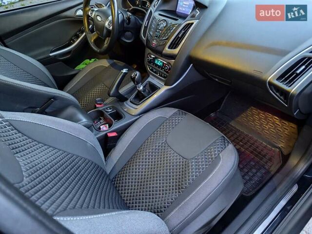 Черный Форд Фокус, объемом двигателя 1.6 л и пробегом 264 тыс. км за 8099 $, фото 7 на Automoto.ua