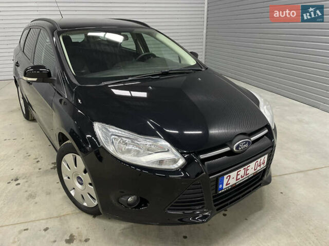 Черный Форд Фокус, объемом двигателя 1.6 л и пробегом 211 тыс. км за 7750 $, фото 12 на Automoto.ua