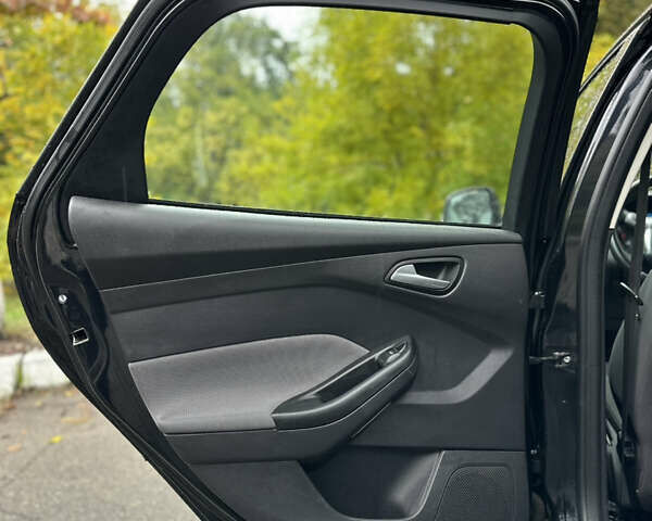 Чорний Форд Фокус, об'ємом двигуна 1.6 л та пробігом 269 тис. км за 6950 $, фото 11 на Automoto.ua