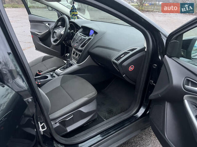 Черный Форд Фокус, объемом двигателя 1.6 л и пробегом 180 тыс. км за 7400 $, фото 17 на Automoto.ua