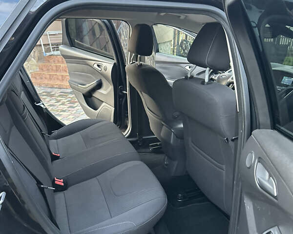 Черный Форд Фокус, объемом двигателя 1.6 л и пробегом 205 тыс. км за 7200 $, фото 40 на Automoto.ua