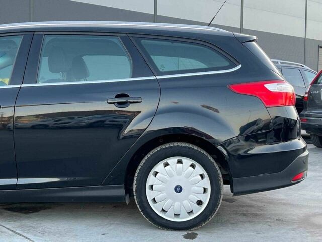 Черный Форд Фокус, объемом двигателя 1.6 л и пробегом 295 тыс. км за 6940 $, фото 5 на Automoto.ua