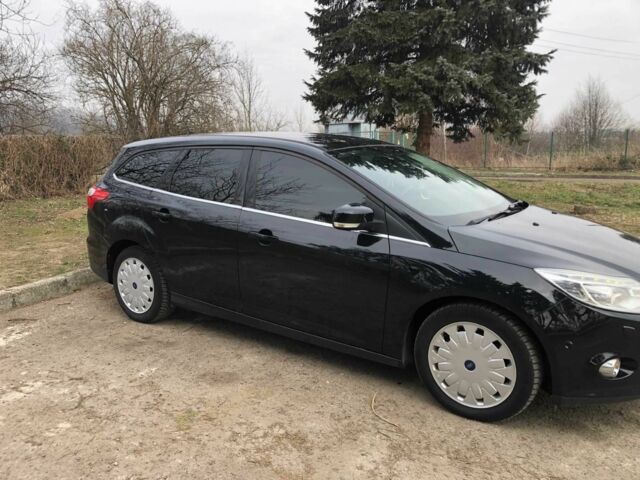 Черный Форд Фокус, объемом двигателя 1.6 л и пробегом 214 тыс. км за 7799 $, фото 14 на Automoto.ua