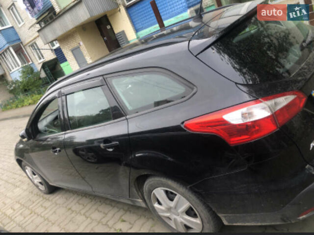 Черный Форд Фокус, объемом двигателя 1.6 л и пробегом 214 тыс. км за 8200 $, фото 1 на Automoto.ua
