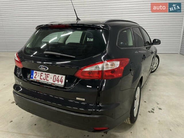 Черный Форд Фокус, объемом двигателя 1.6 л и пробегом 211 тыс. км за 7750 $, фото 15 на Automoto.ua