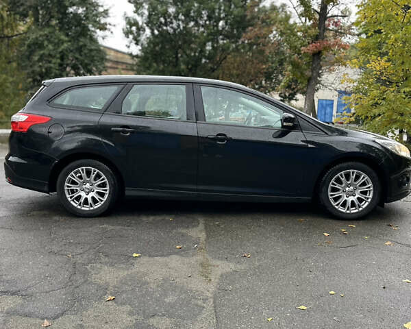 Чорний Форд Фокус, об'ємом двигуна 1.6 л та пробігом 269 тис. км за 6950 $, фото 4 на Automoto.ua