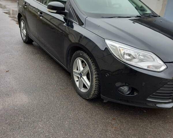 Черный Форд Фокус, объемом двигателя 1.6 л и пробегом 250 тыс. км за 7000 $, фото 2 на Automoto.ua