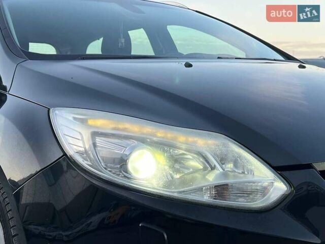 Чорний Форд Фокус, об'ємом двигуна 1.6 л та пробігом 295 тис. км за 7890 $, фото 11 на Automoto.ua